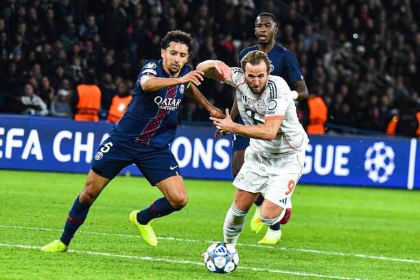 PSG vs. Bayern. Na fotke Marquinhos (PSG) v súboji s Harrym Kanom (Bayern).
