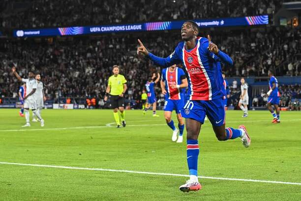 Radujúci sa Ousmane Dembélé po&nbsp;strelenom góle v&nbsp;Lige majstrov.